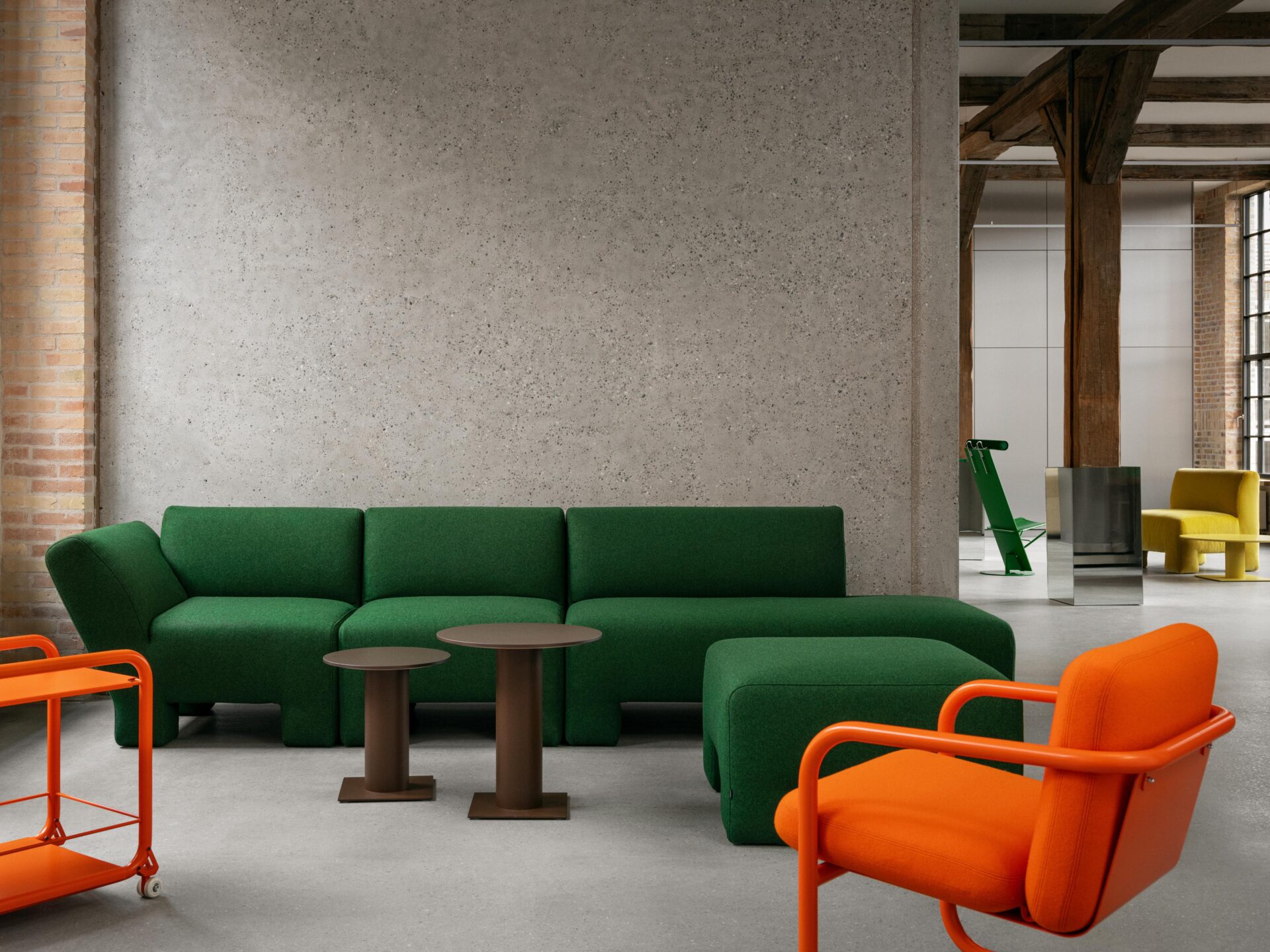 lammhults_geofanti_modularseating_green_tension_trolley_orange_ciao_table_brown_s704_easychair_orange_e01